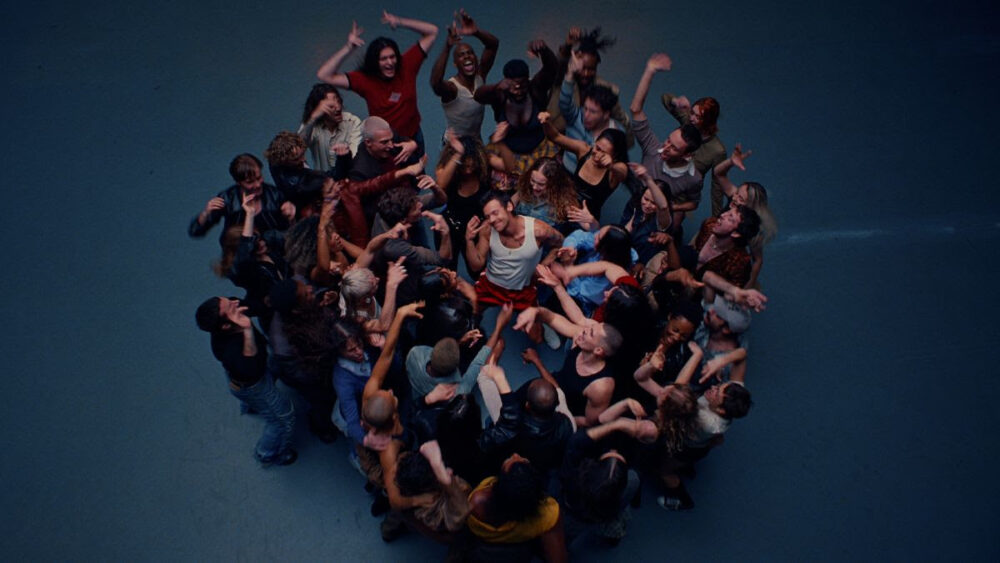 Harry Styles performing in the Dance No More music video